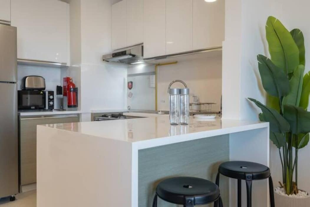 Apartment Stylish 1-bedroom Retreat With Pool In Vibrant Jumeirah Golf Estates Dubai